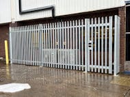 Palisade fencing and gate protecting the air-conditioning units
